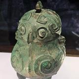 青铜鸮卣头像
